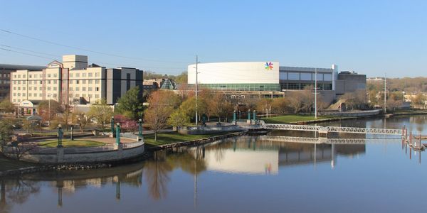 Moline, Illinois river front, with the Wyndham Hotel, Vibrant Arena, and Channel Cat Water Taxi dock