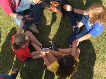 meadow vue ranch horse camp holding hands