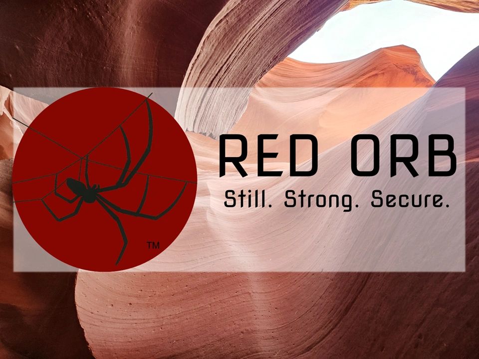 Logo of Red Orb with a spider inside a red circle and the tagline 'Still. Strong. Secure.'