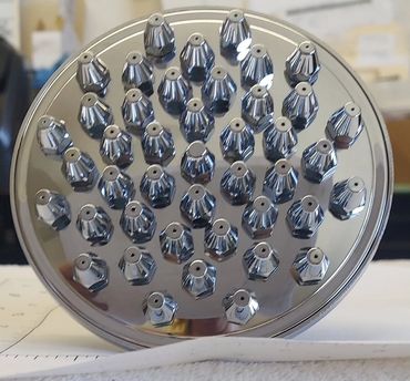 5" Diameter solid brass shower head with 42 jets