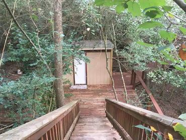 yoga treehouse outhouse