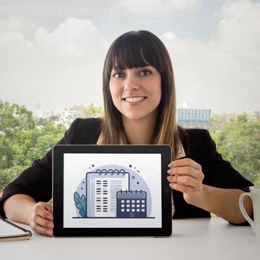 Attractive woman smiling and holding an iPad displaying an image regarding funding due to FQ3C™