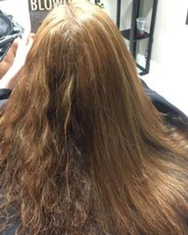 Unhealthy hair in the process of a keratin treatment Brazilian Blowout treatment last up to 12 weeks