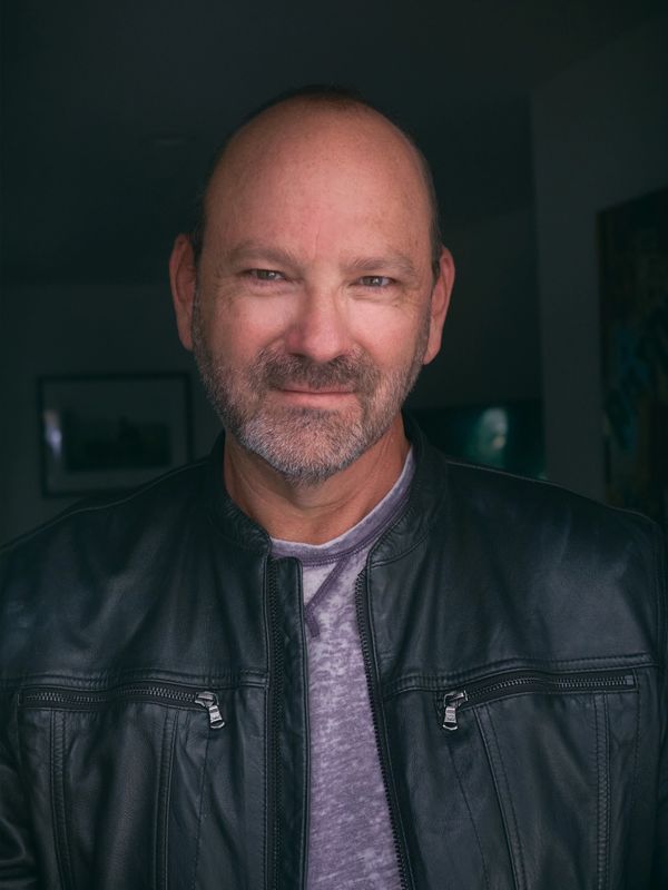 Los Angeles Composer and Songwriter Seth Hancock hanging in his recording studio.