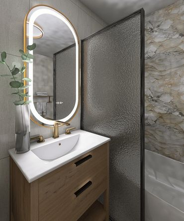 Modern bathroom with illuminated mirror, wooden vanity, and textured glass shower screen.