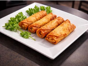 Crispy golden egg rolls filled with rich, savory flavor and fried to perfection.