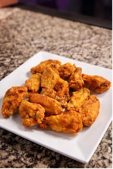 Crispy wings tossed in bold house seasoning. Ask your server for our flavors