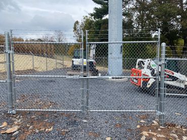 Cell tower site with 6' Chain link 1' Barbwire