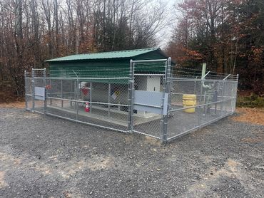 Natural Gas Odorant site with 6' Chain link and 1' of barbwire also including Panic Gates