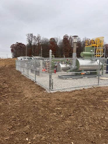 Filter Separator with 6' chain link with 1' of barbwire including 2 20' Cantilever Gates