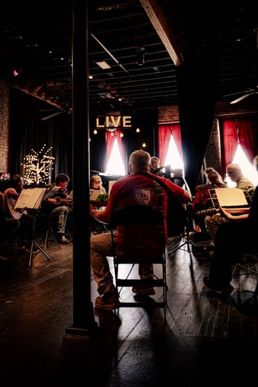 This is a picture of the students in one of Ashlee’s guitar classes.
