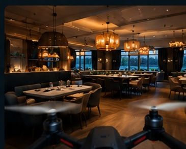 FPV drone flying through a modern restaurant and hospitality venue