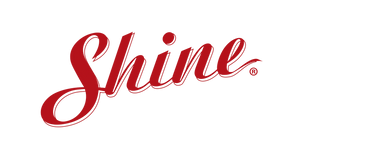 Red cursive Shure logo on black background.
