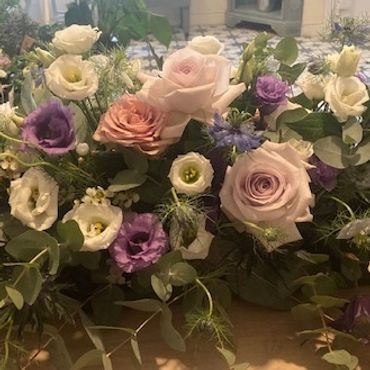 Delicate flowers, Roses, lavender eustoma, eucalyptus, wedding flowers, altar arrangement, wedding c
