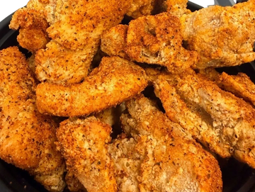 Close-up of crispy fried chicken pieces.