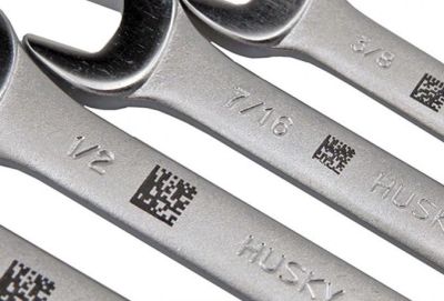 Set of wrenches with QR codes on them.