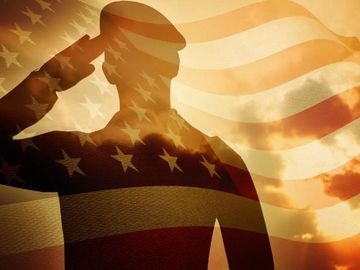 Soldier shadow over American flag