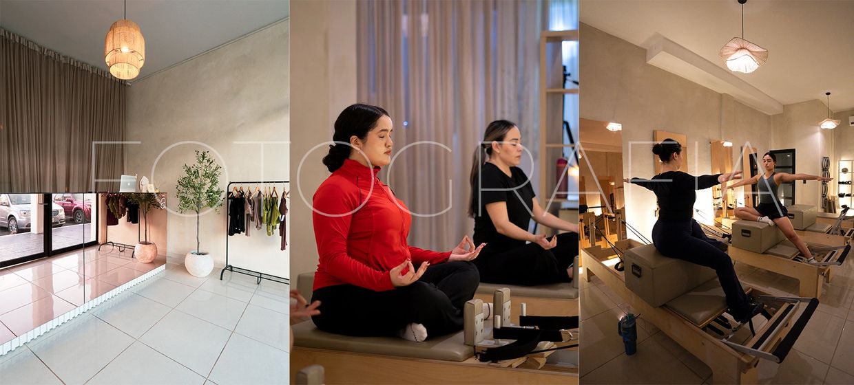 Women practicing Pilates and meditation in a modern studio with natural light.