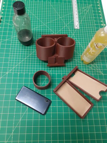 Using two different size bottles and phone to make a 3 part addition.