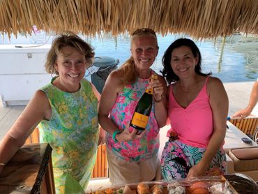 Toasting the key west sunset on a tiki boat