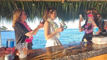 Party with your besties on a Tiki Boat Adventures Key West Sunset Cruise