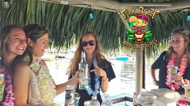 Party with your besties on a Tiki Boat Adventures' Key West Sunset Cruise