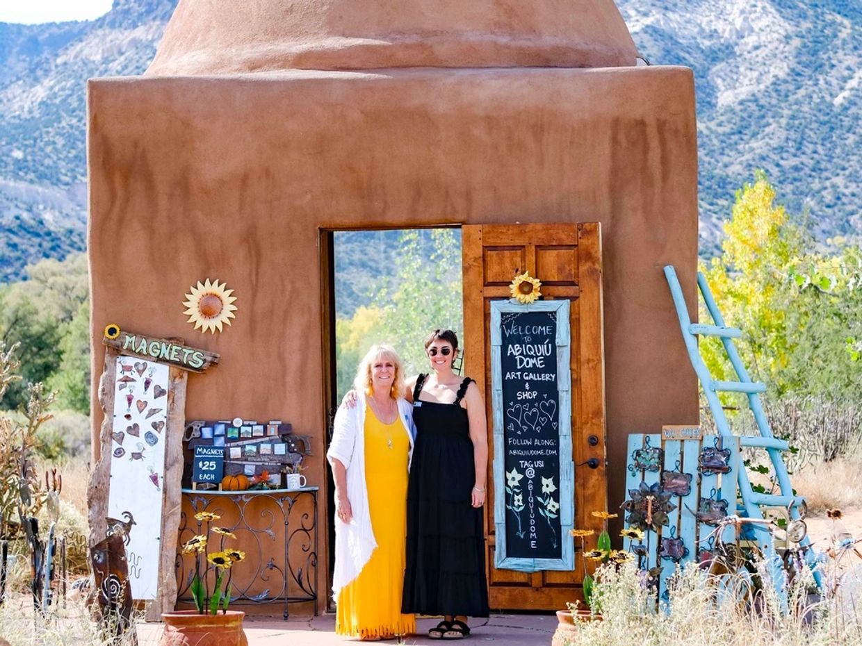 Connie B. & Becca standing in front of Abiquiú Dome.