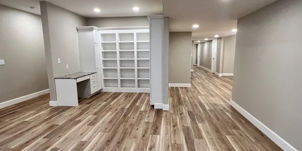 Expansive basement finished with top quality materials and tall ceilings