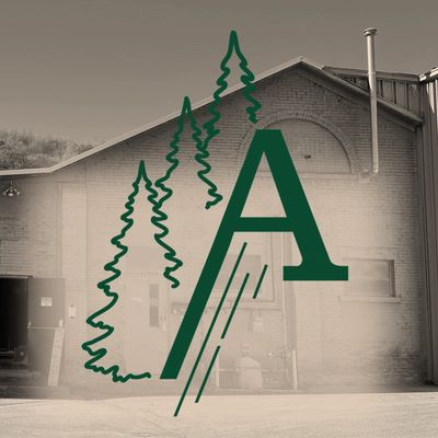 Logo of a stylized letter A with pine trees in front of a brick building.