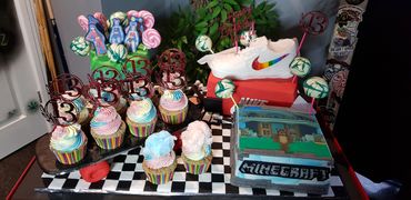 Colorful Minecraft and sneaker-themed birthday cupcakes and cake for a 13th birthday.