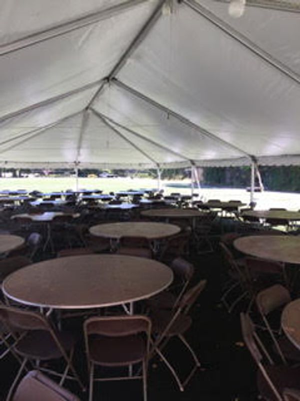Tent and chair setup for outdoors event
