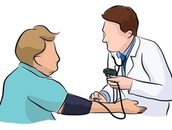 Cartoon doctor taking patient's blood pressure.
