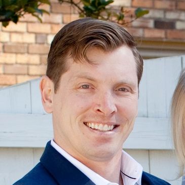James Wydick smiles at the camera.