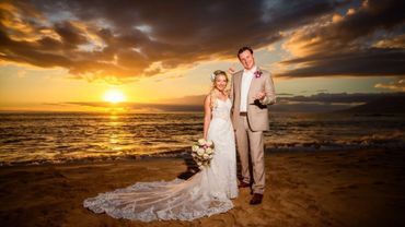 wedding couple at the beach during sunset