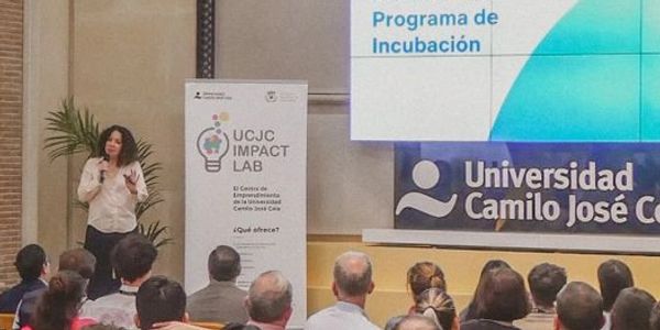 Speaker presenting at UCJC Impact Lab's incubation program event.