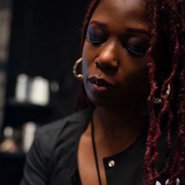 Brittany Brown tattoo artist and piercer.