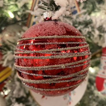 Sullivans beautiful frosted red glass ornament is simply a Christmas classic, with a glittered swirl