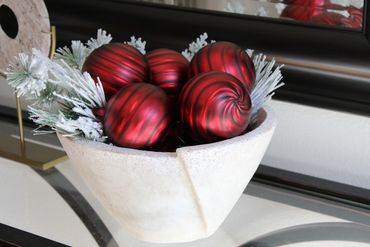 K & K Interiors classic 4" matte red swirl glass Christmas ornament is beautiful in a bowl.