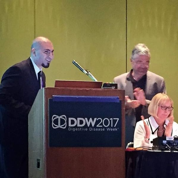 Dr Albusoda receiving the American Gastroenterology Recognition Certificate