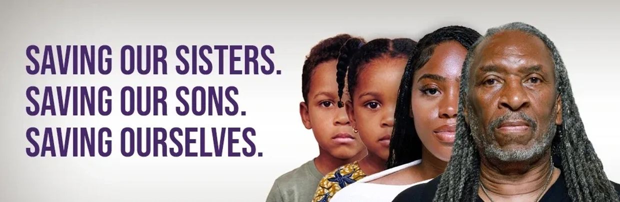 A black family of four. The person in the front is an older man with black and grey dreadlocks. Behi