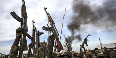 Guns raised in air in South Sudan civil war