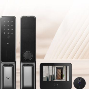 Modern black smart door locks with a video doorbell system.