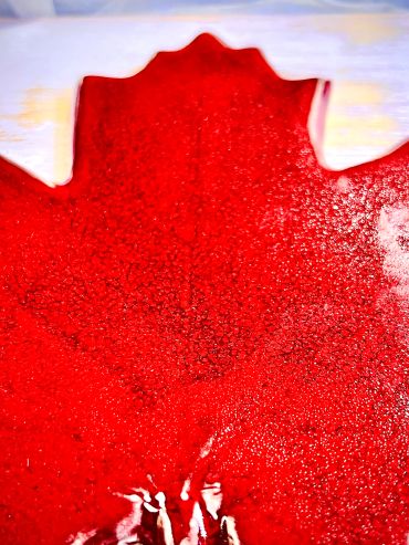 Close-up of textured red liquid or gel.