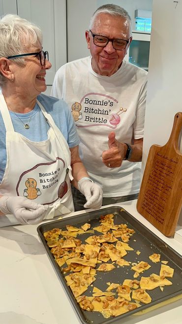 The owners showing how each batch is made with live and a thumbs up approval