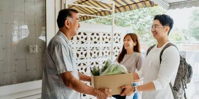 Customers sharing a food box