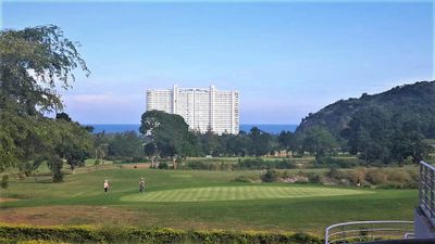 Hua Hin Korea golf course with Milford Paradise hotel in the back, Golf Sea City Guest House Hua Hin