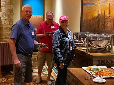 Members in buffet line