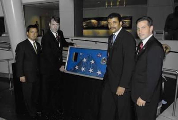 Flag rescued from Ground Zero, Jerry  second from left; Photo shared by J. Kane
