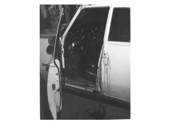 Route 5 in Sherrill, NY on September 8, 1969 - Chief Thomas Reilly's police car showing blood stains
