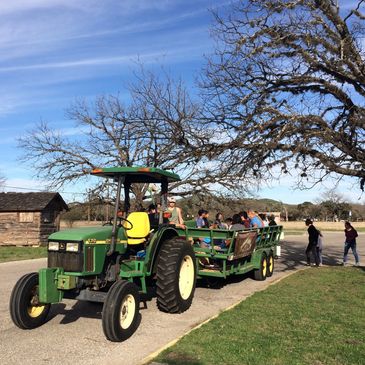 Tractor and hayride ready to depart the visitor center.